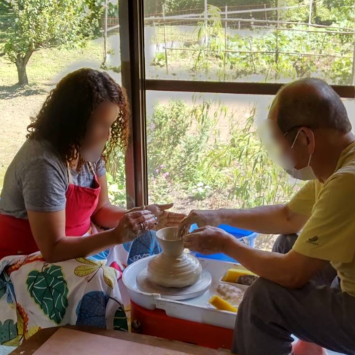 Participants doing pottery image 1