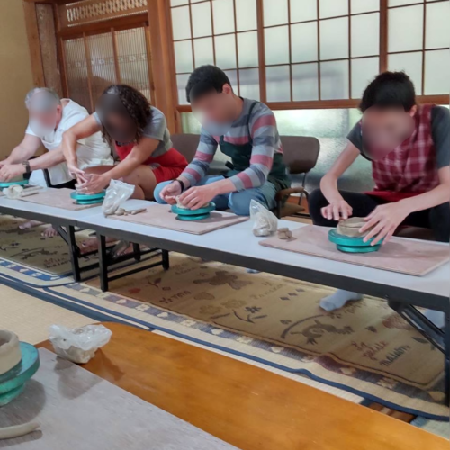 Participants doing pottery image 2