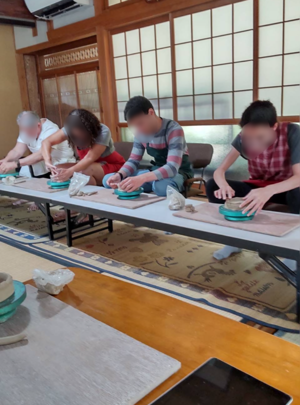 Participants doing pottery image 2